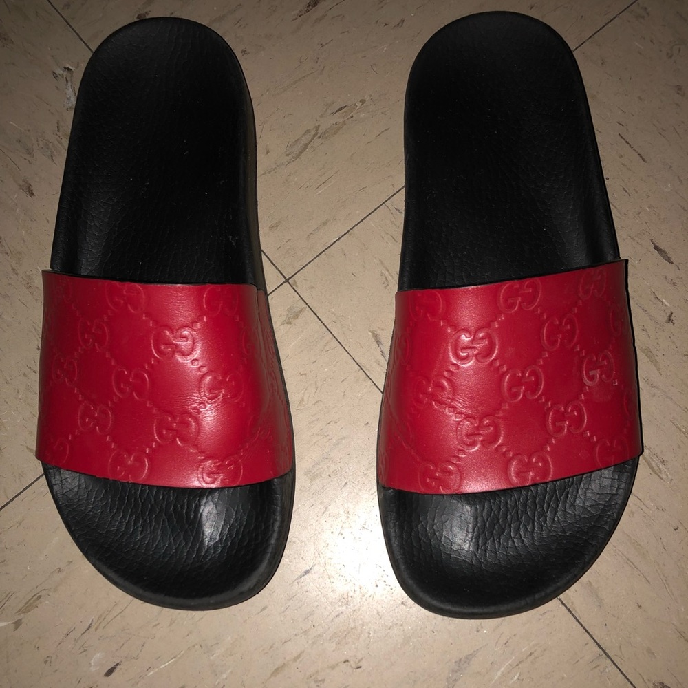 Red leather Gucci slides